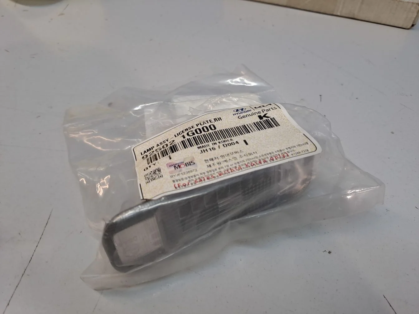 Фонарь подсветки номерного знака правый для KIA Rio 3 2012-2017