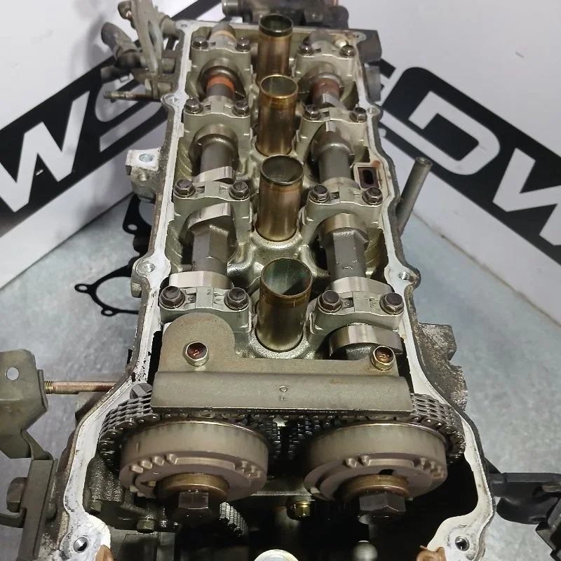 Двигатель Nissan Wingroad 101028N250 WFY11 QG15DE