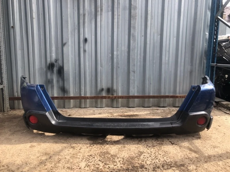Бампер Nissan X-Trail 2007-2010 85022JU14H T31, задний