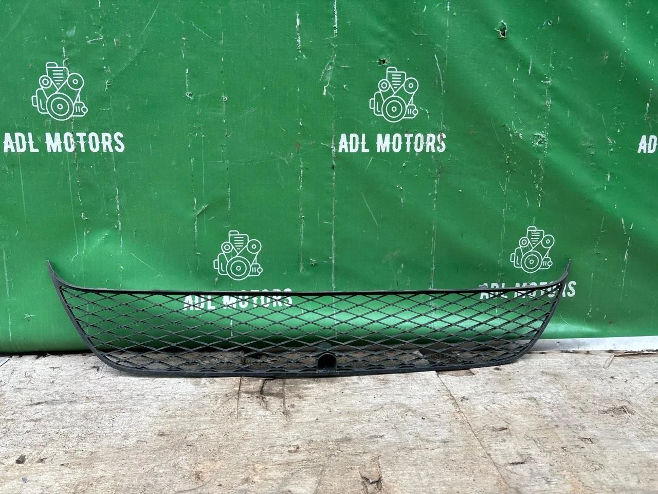 Решетка бампера Mitsubishi Outlander XL 2009-2012 6402A037, передняя