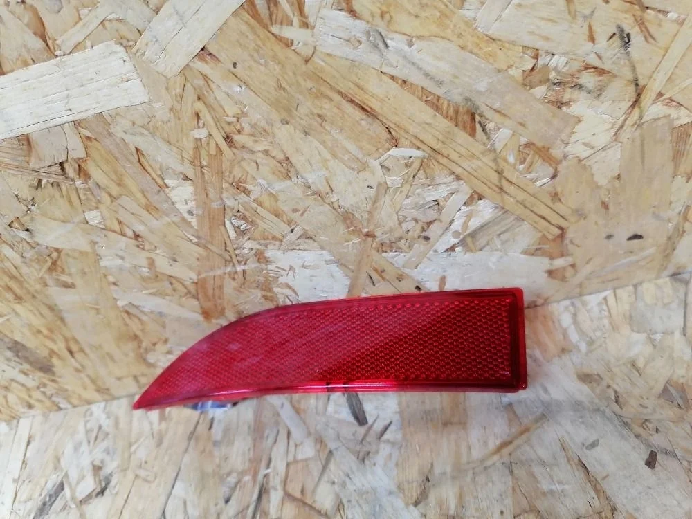 Отражатель в бампер задний левый Renault Logan II (2012—2018)