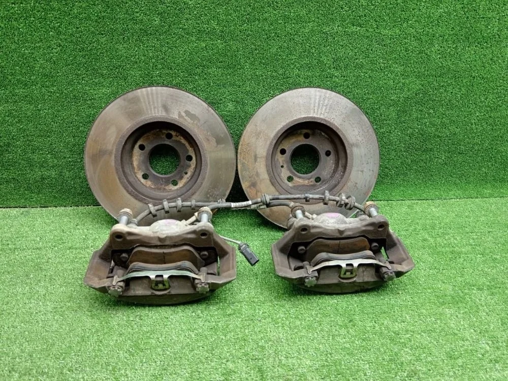 Суппорт тормозной передний Audi A4 Allroad Quattro B8 (2009—2011)