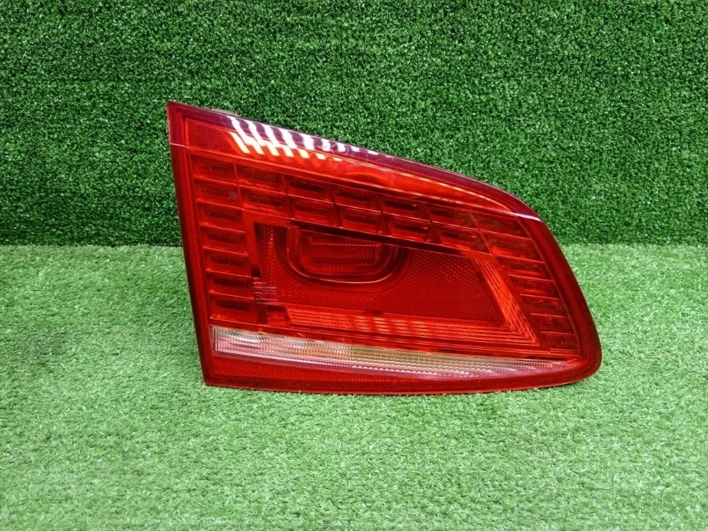 Фонарь левый в крышку Volkswagen Passat B7 (2010—2015)