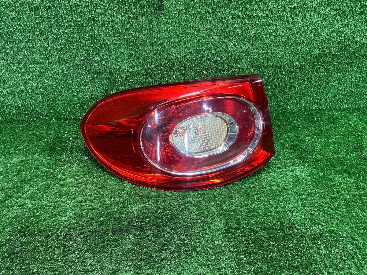 Фонарь левый Volkswagen Tiguan I (2007—2011)