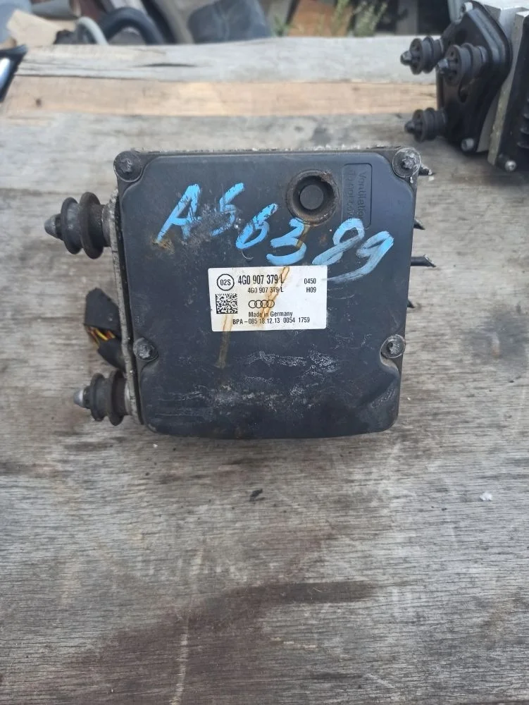 Блок ABS (насос) Audi A6 C7 рестайлинг (2014—2018) б.у 4G0907379L