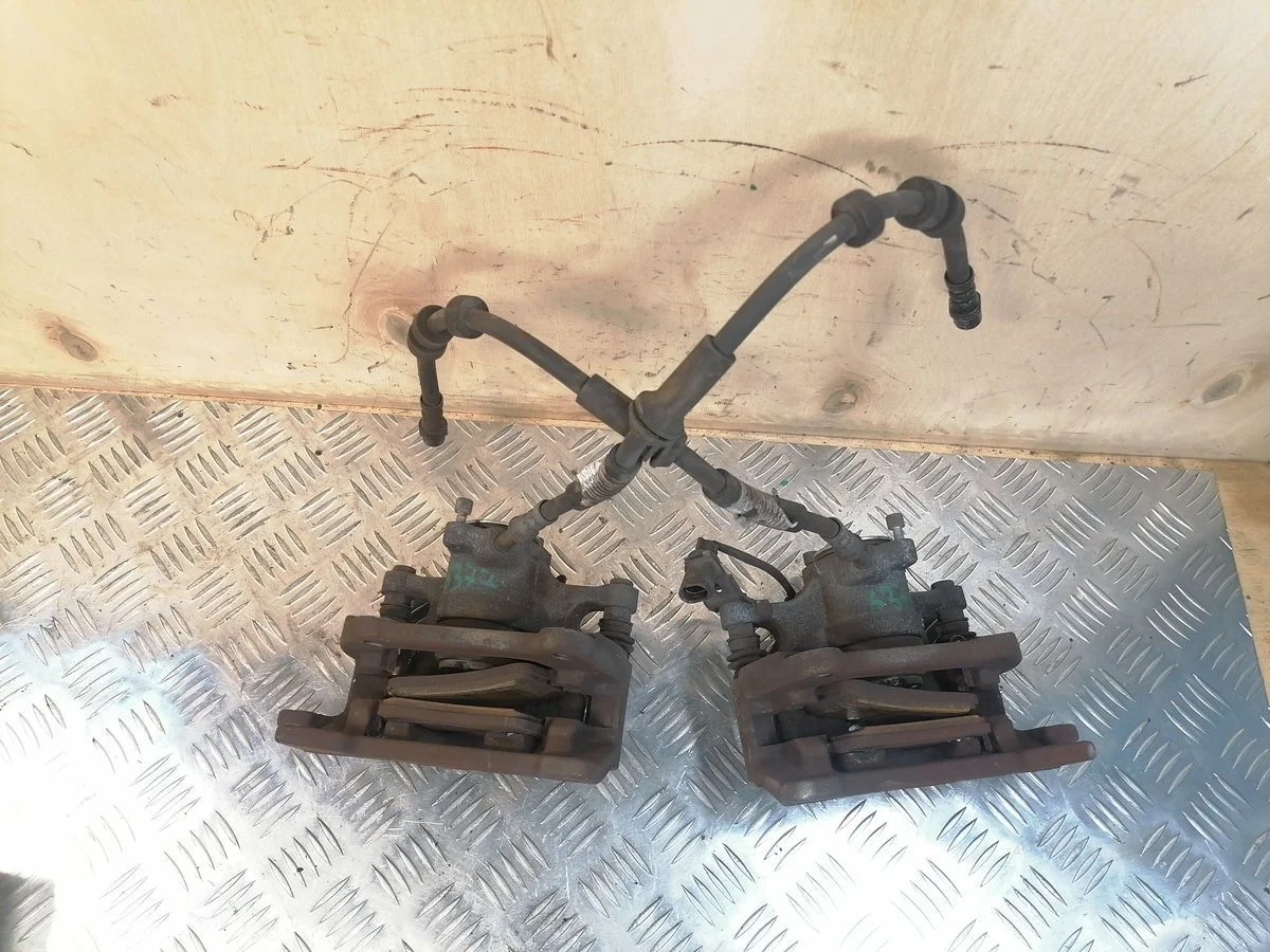 Суппорт тормозной задний Audi A6 C7 (2011—2014)