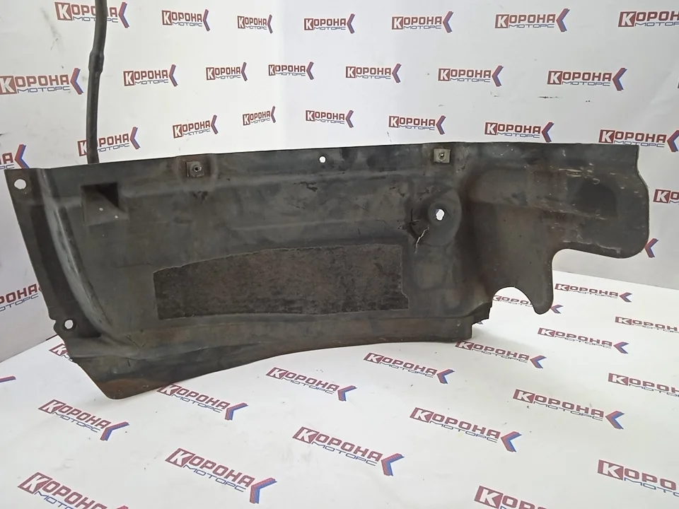 Спойлер переднего левого колеса Б/У Оригинал не большая трещинка