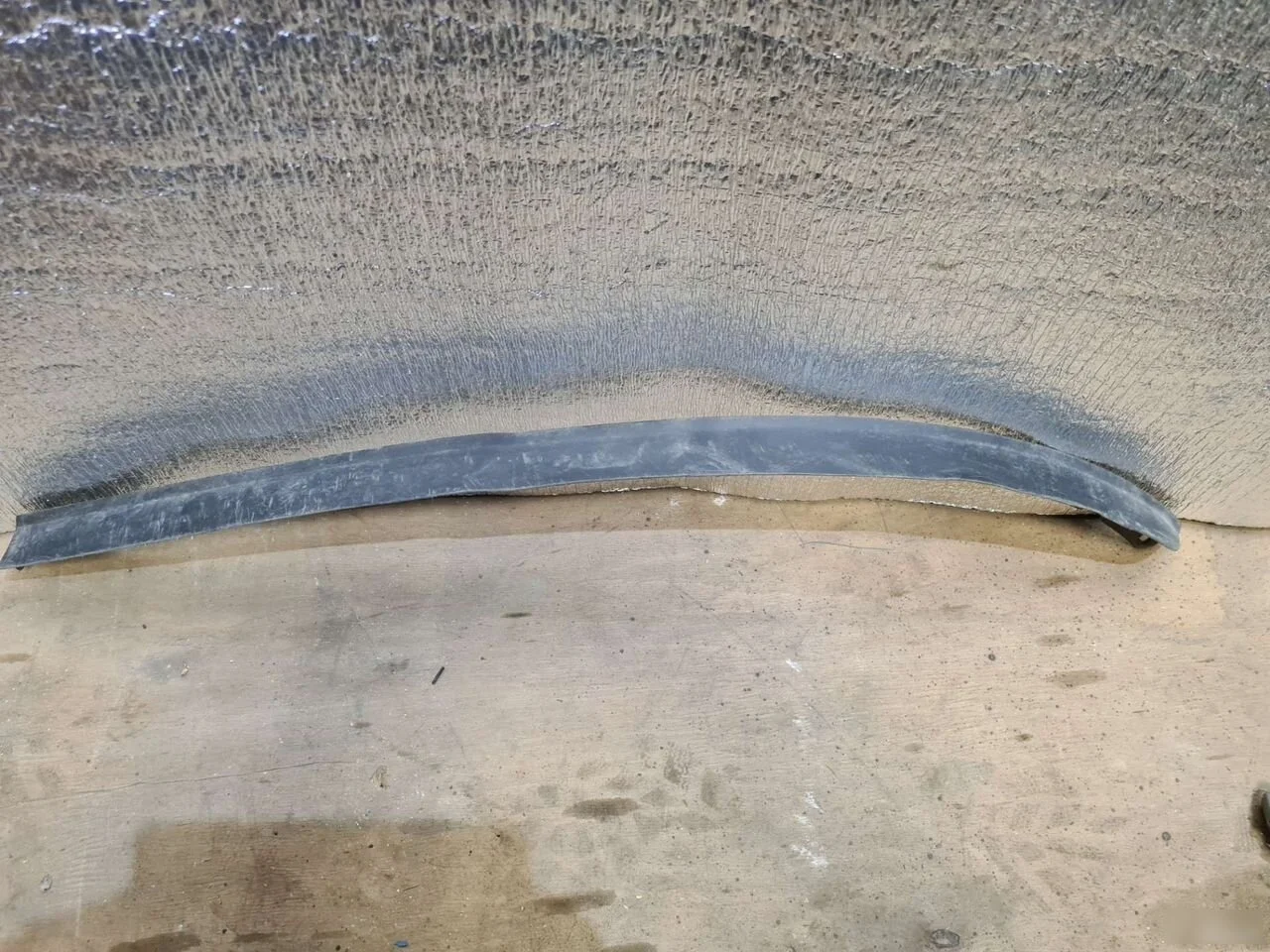 Спойлер переднего бампера левый Mazda 2 II (2007—2010)