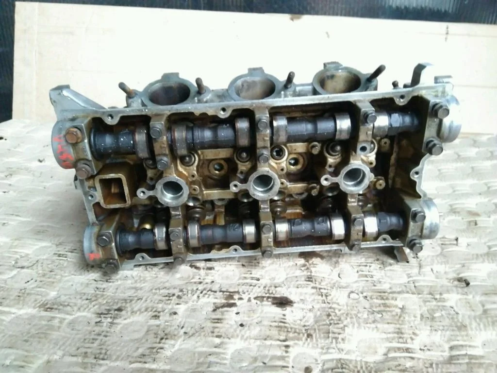Б.у. головка блока цилиндров MITSUBISHI PAJERO V45W MITSUBISHI PAJERO V45W 6G74 1993-2000