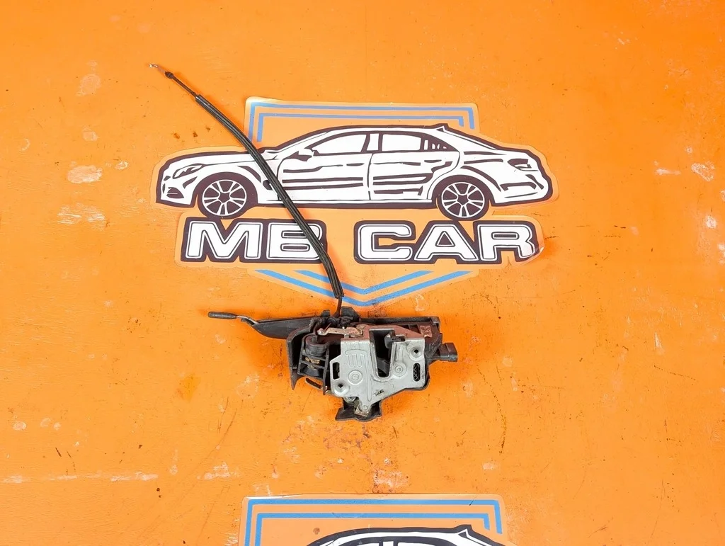 Замок двери передней левой Mercedes-Benz