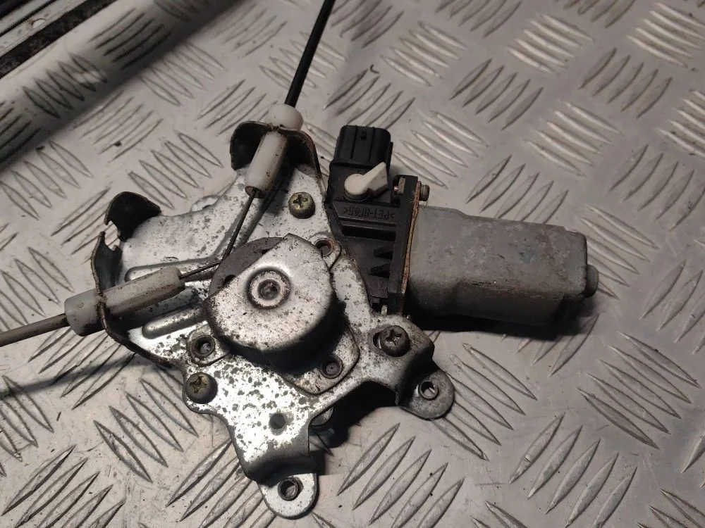 Моторчик стеклоподъемника п. л. Mitsubishi Lancer