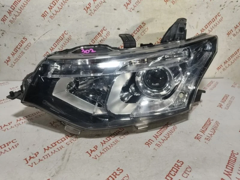 Фара ксеноновая передняя левая Mitsubishi