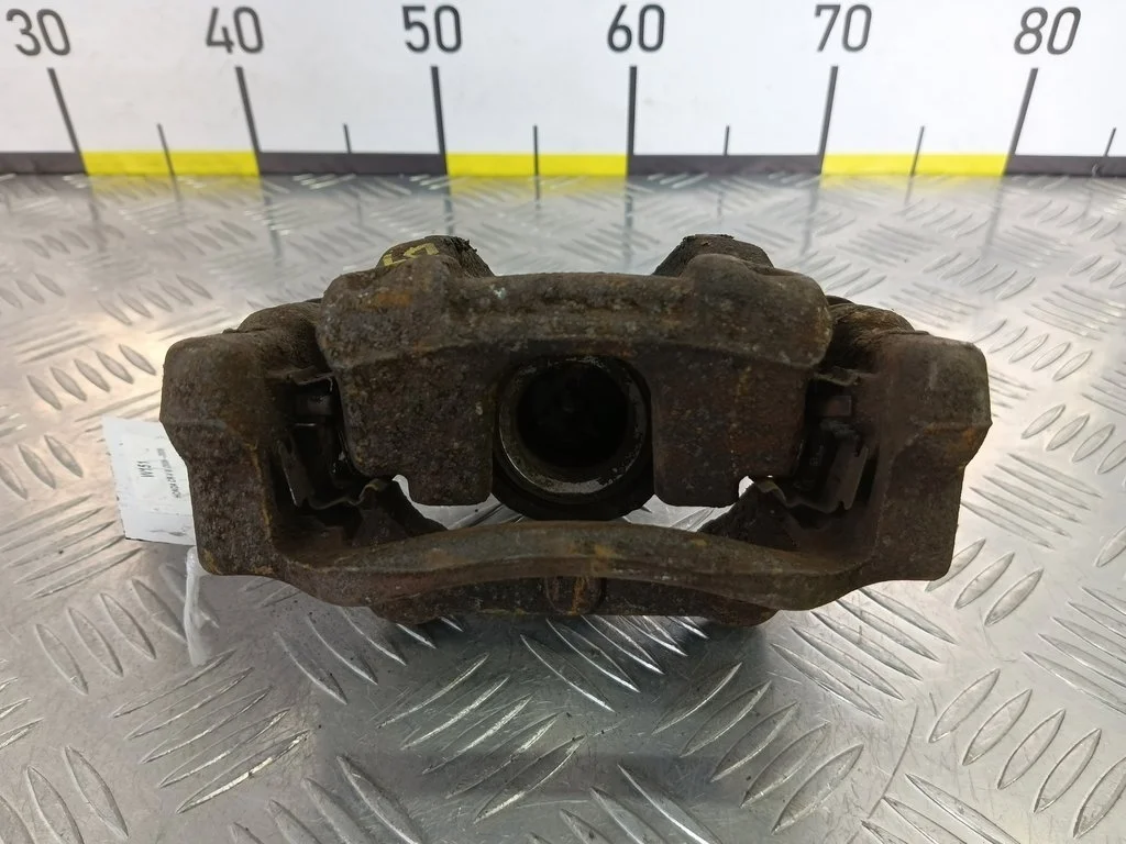 Суппорт задний левый HONDA CR-V III (2006—2009)