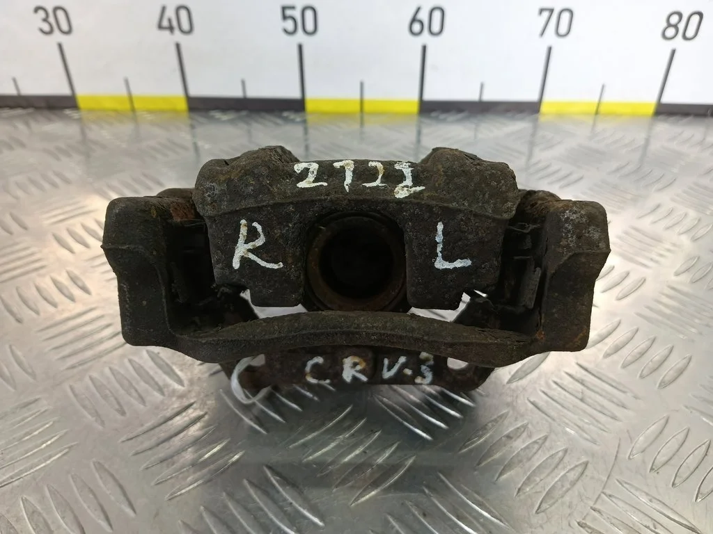 Суппорт задний левый HONDA CR-V III (2006—2009)