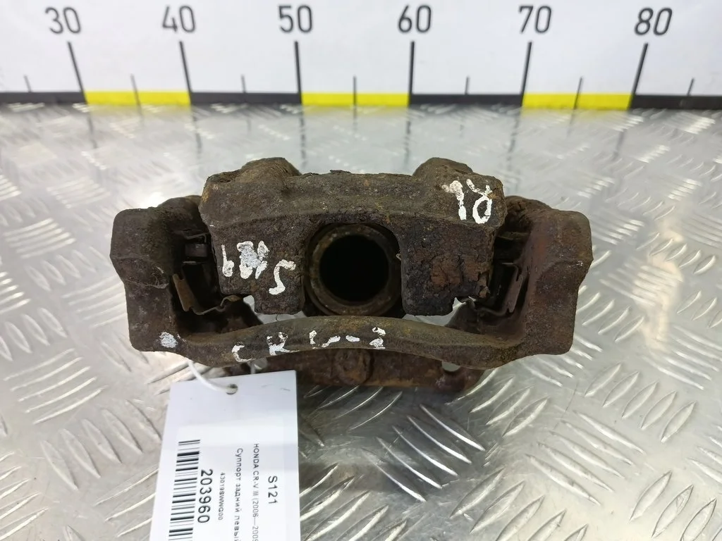 Суппорт задний левый HONDA CR-V III (2006—2009)