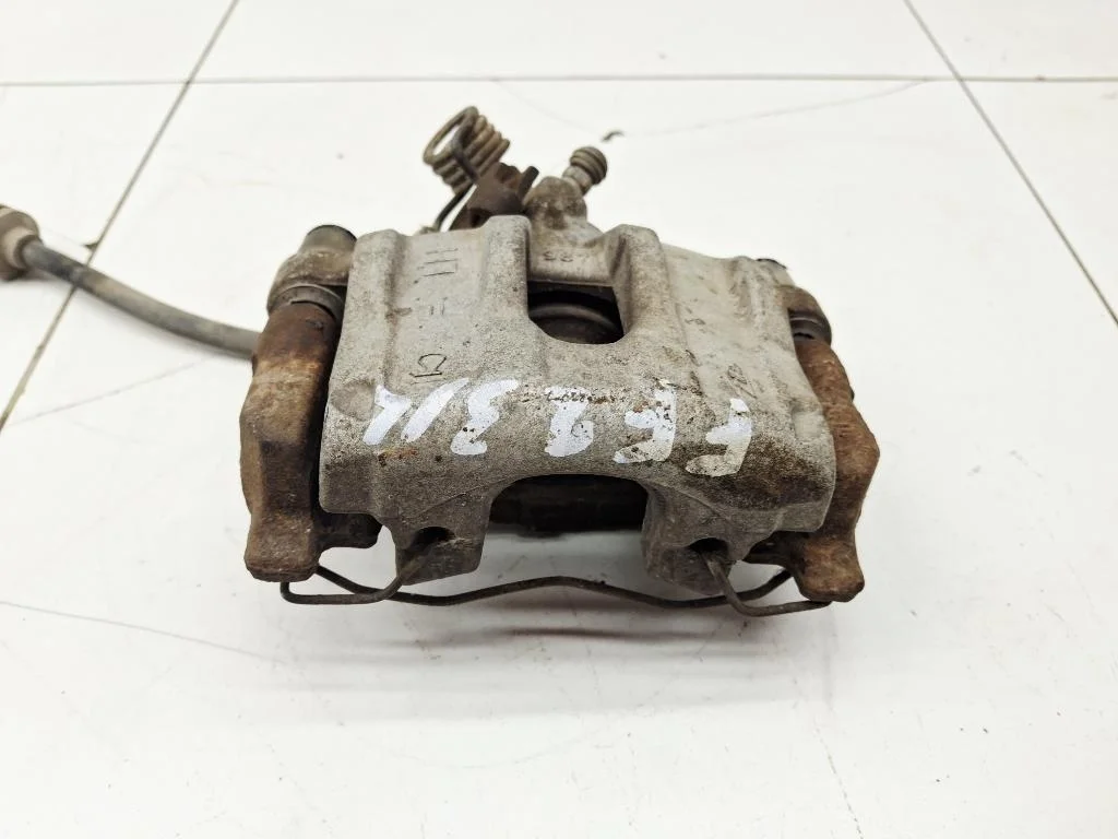 Суппорт задний левый Ford Focus 2007