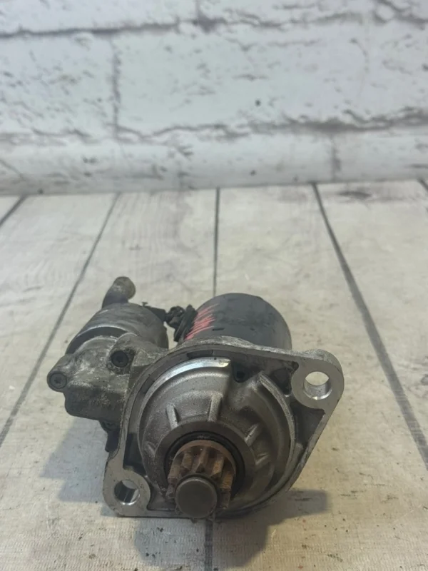 Стартер VW Passat 2009 B6