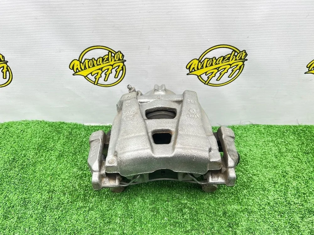 Суппорт тормозной передний правый Volkswagen Tiguan I рестайлинг (2011—2019)