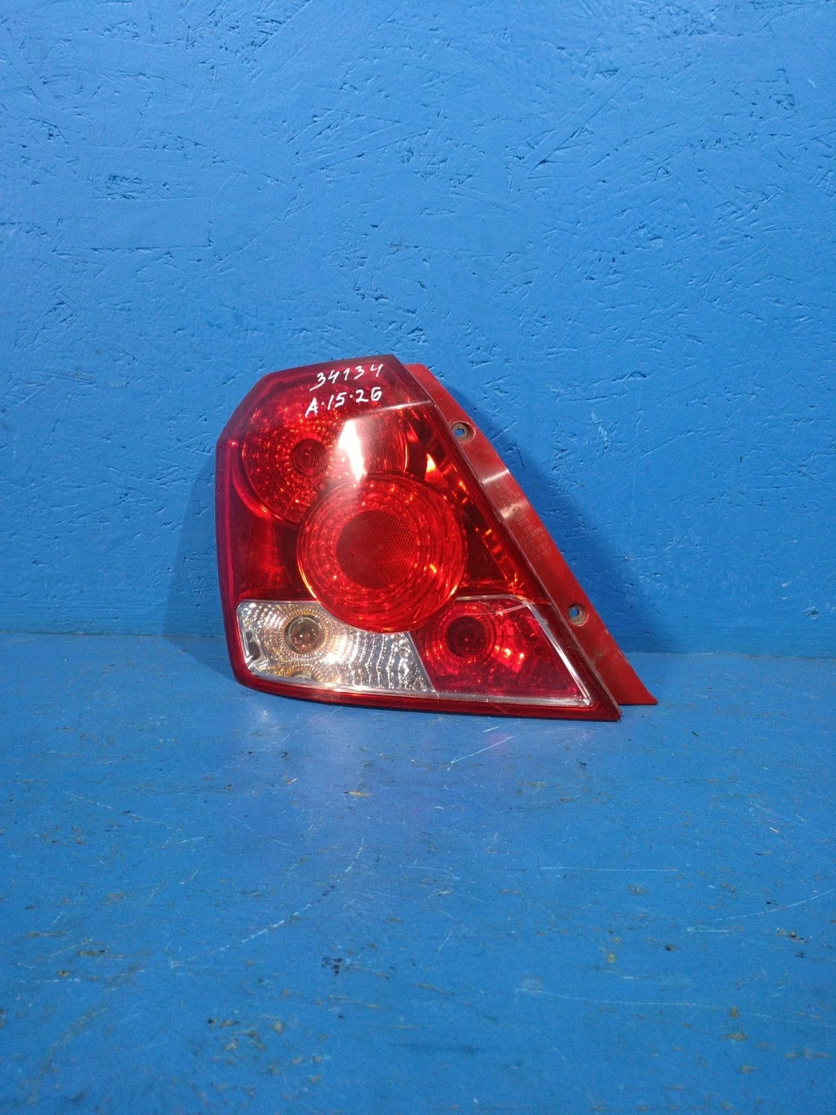 Фонарь задний левый Chevrolet Aveo I (2003—2008) XUUSF48TJ70000388 96540268 Лево Зад B12S1