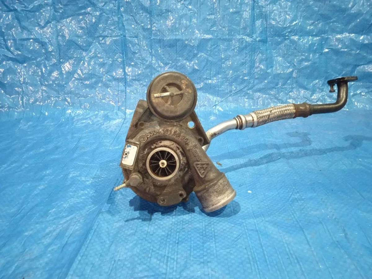 Турбокомпрессор (турбина) Volkswagen Passat B5 рестайлинг (2000—2005)  058145703H   AWM