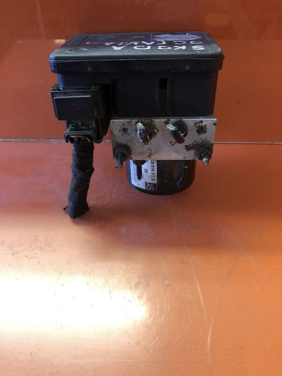 Блок (насос) ABS Skoda Octavia I рестайлинг (2000—2011)