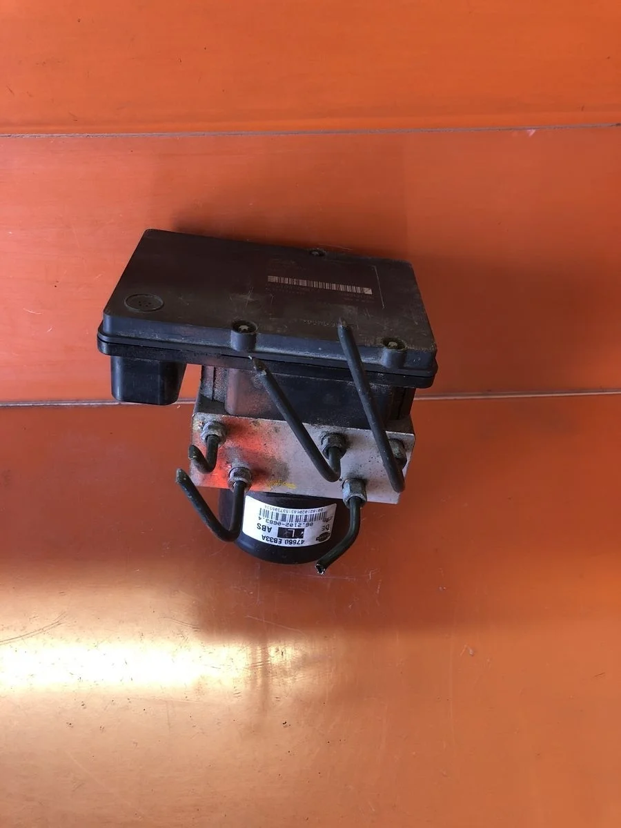 Блок (насос) ABS Nissan Navara D40 (2004—2010)