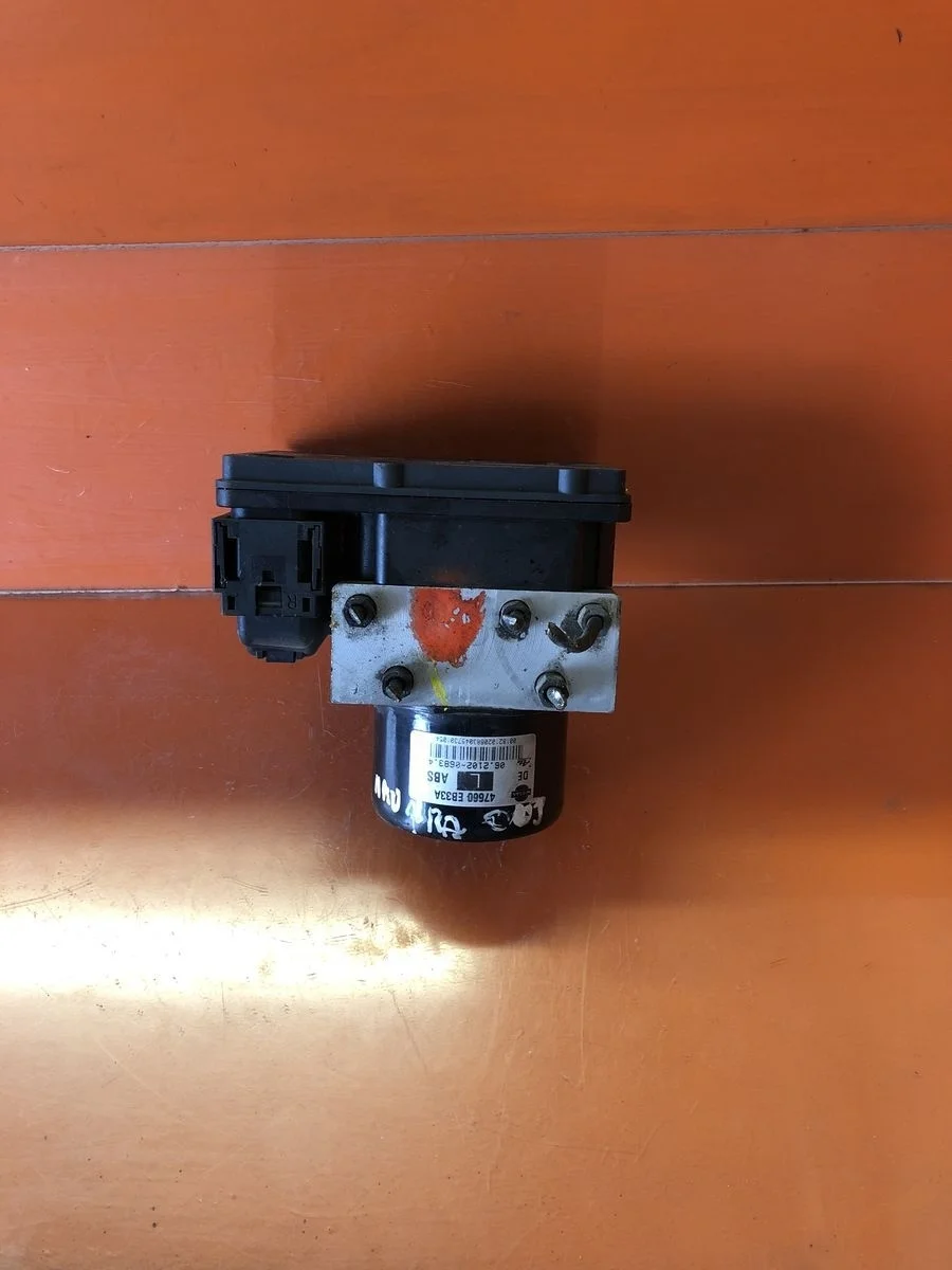 Блок (насос) ABS Nissan Navara D40 (2004—2010)