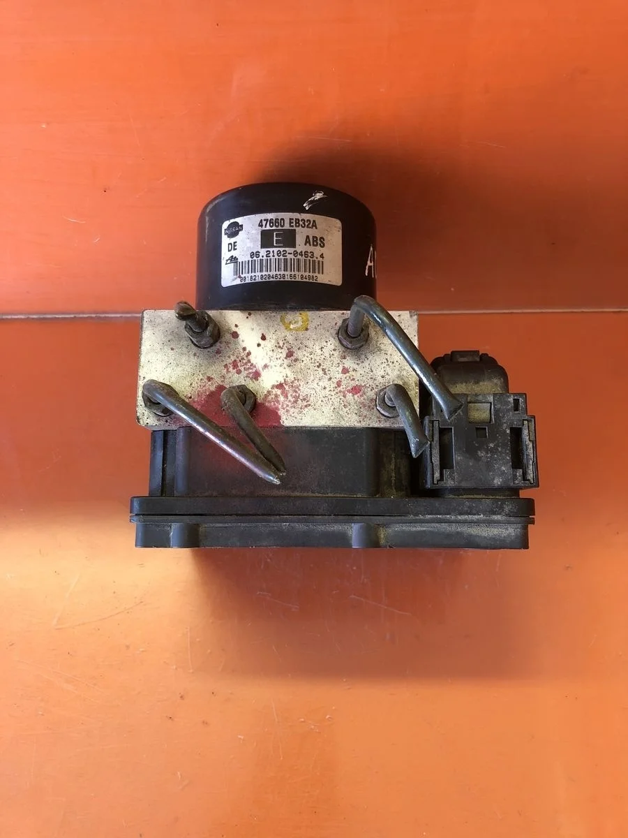 Блок (насос) ABS Nissan Navara D40 (2004—2010)