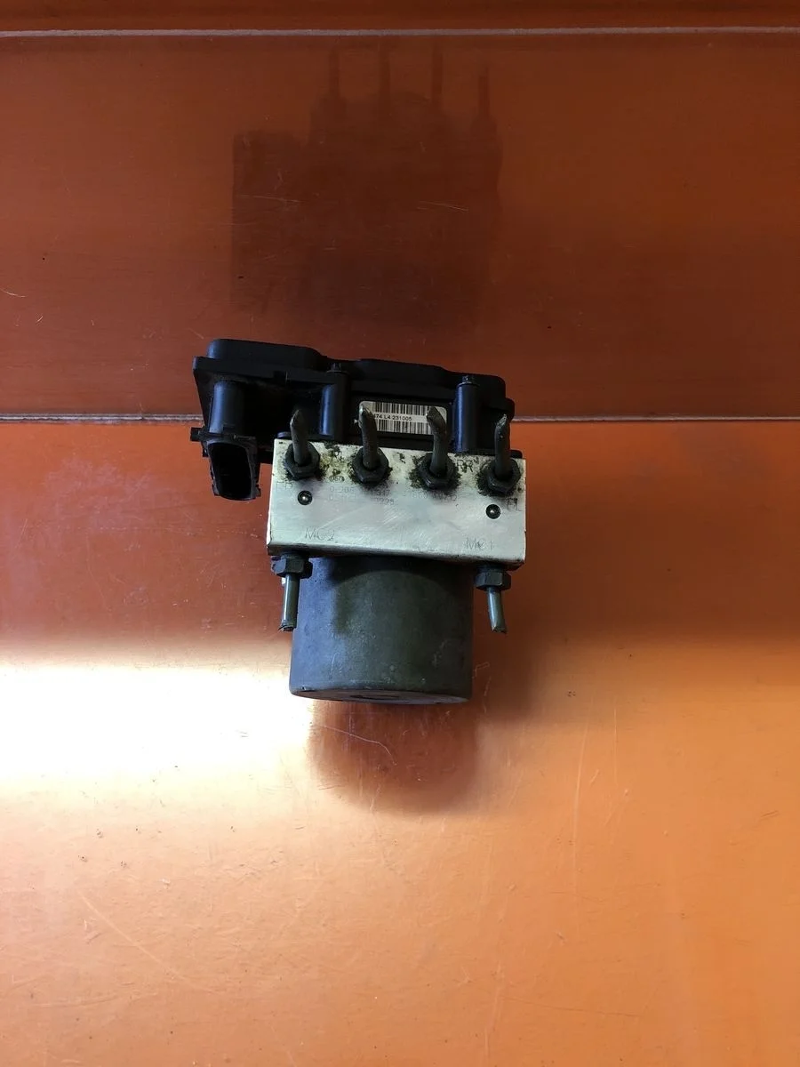 Блок (насос) ABS Nissan Primera P12 (2001—2008) P12 47660AV712