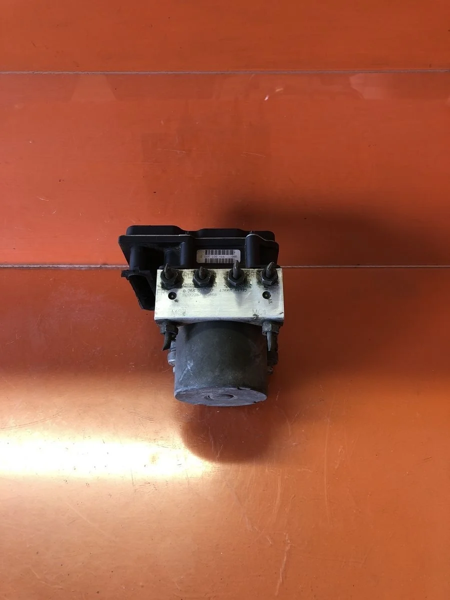 Блок (насос) ABS Nissan Primera P12 (2001—2008) P12 47660AV712