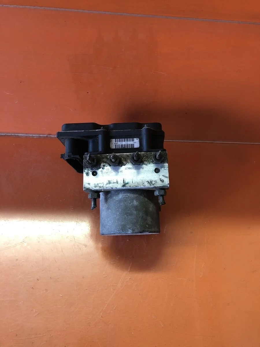 Блок (насос) ABS Nissan Primera P12 (2001—2008) P12 47660AV712