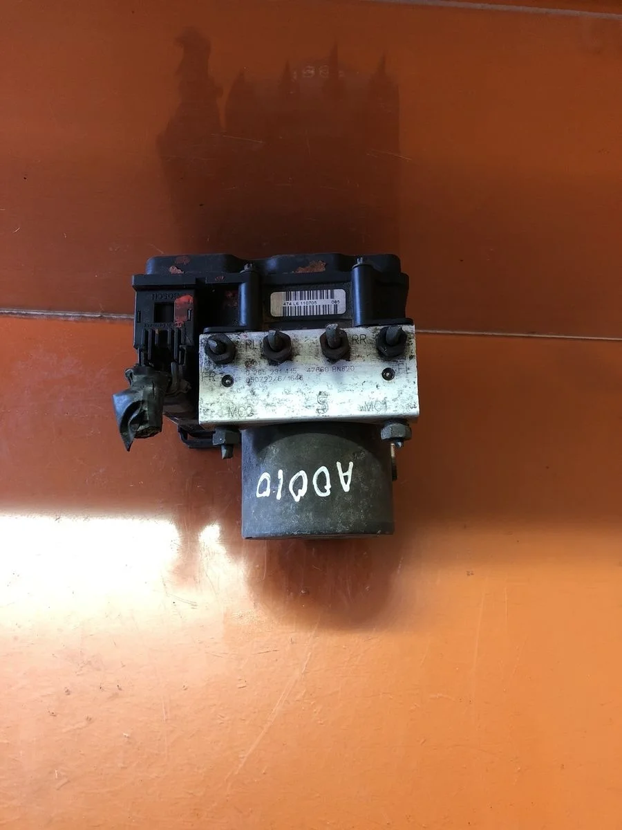 Блок (насос) ABS Nissan Almera N16 рестайлинг (2002—2006) N16 2 поколение 47660BN820