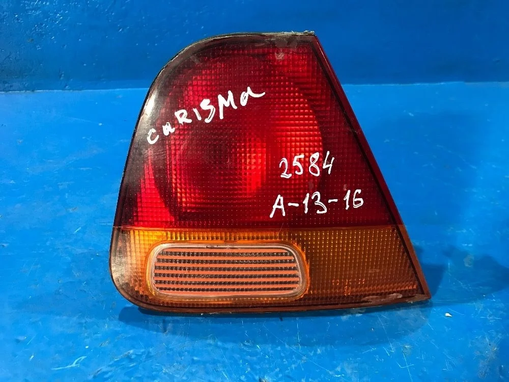 Фонарь задний внутренний левый Mitsubishi Carisma I (1995—1999) DA_A DA1A DA2A MR179509, MB952985 Лево Зад