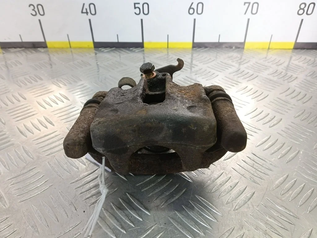 Суппорт задний левый MITSUBISHI CARISMA I рестайл