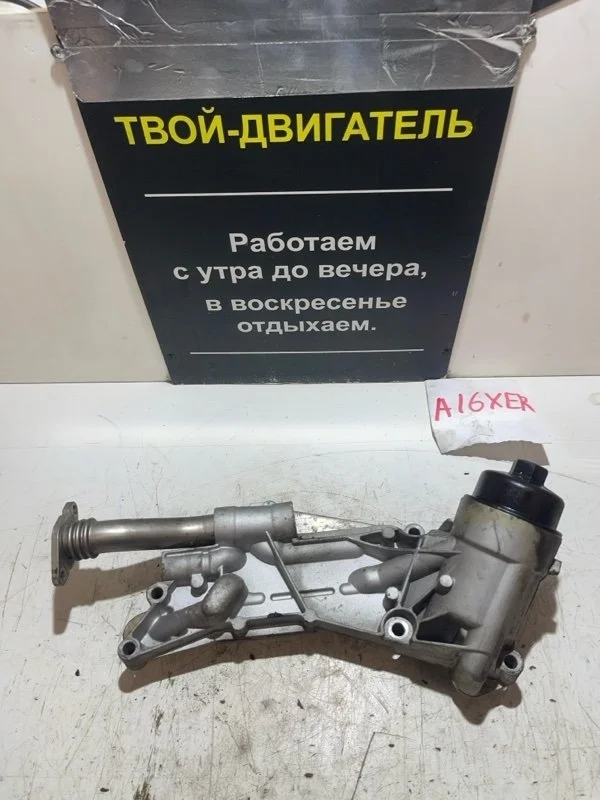 Масляный радиатор Opel astra 2013 J