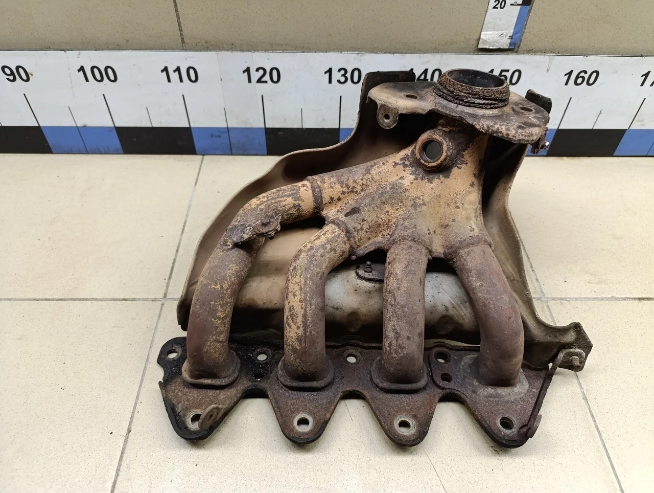 Коллектор выпускной Logan 2005-2014