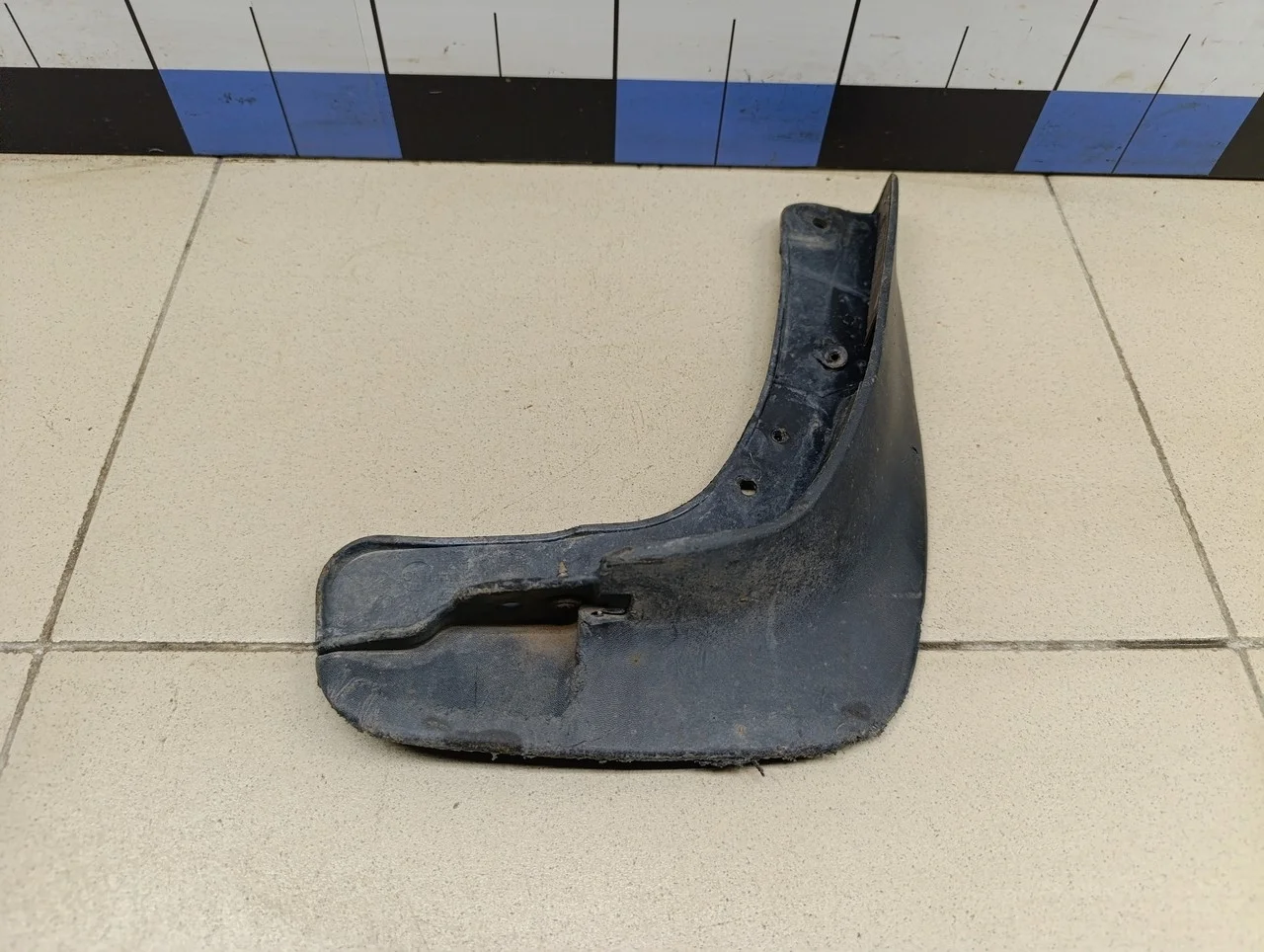 Брызговик передний правый Fluence 2010>