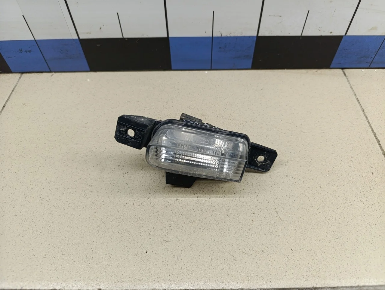 Фонарь задний в бампер левый Tiguan 2011-2016