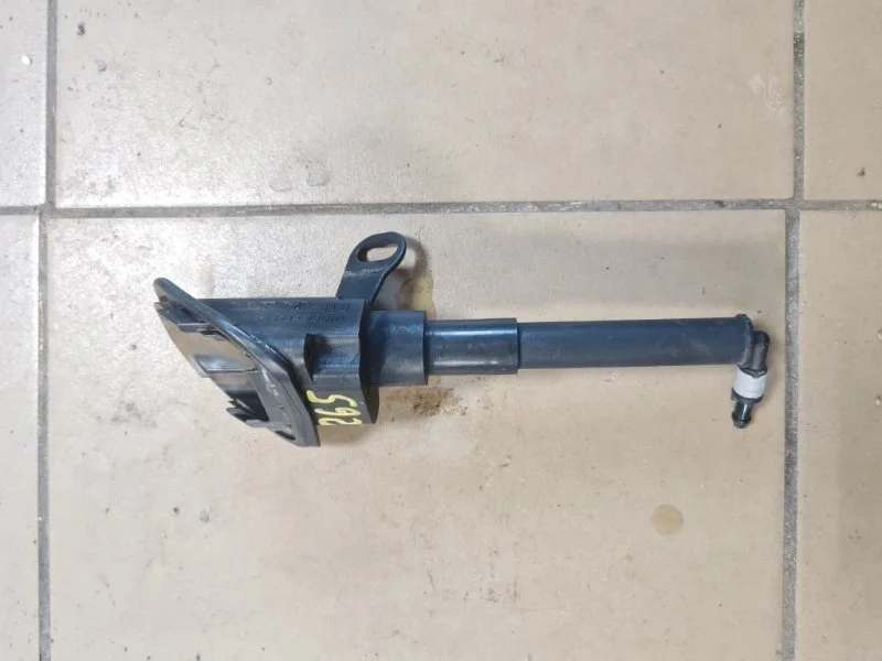 Форсунка омывателя фары Volvo XC90 2012 31283785 B6324S5, правая