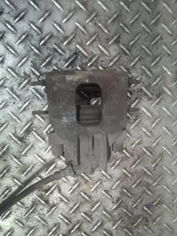 Суппорт тормозной Ford Focus 1   F L