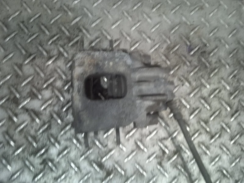 Суппорт тормозной Ford Focus 1   F L