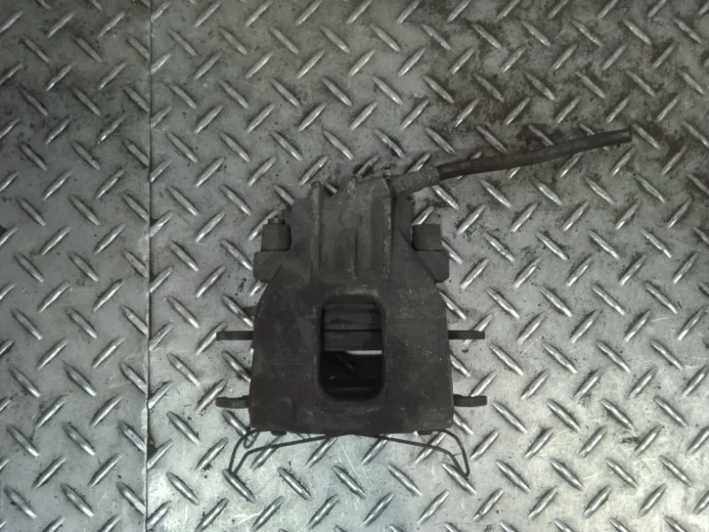 Суппорт тормозной Ford Focus 1   F L