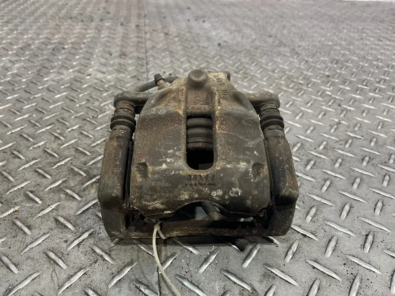 Суппорт тормозной NISSAN Micra K12E   F R