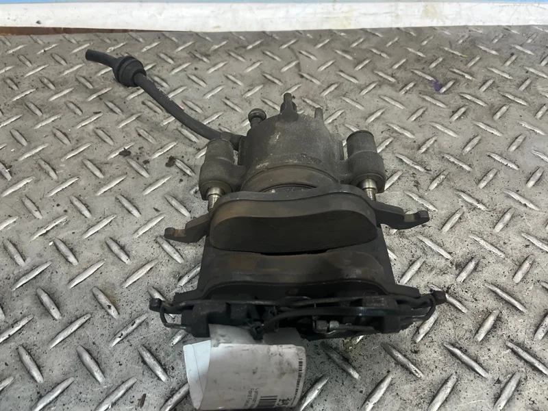 Суппорт тормозной Ford Focus 1   F L