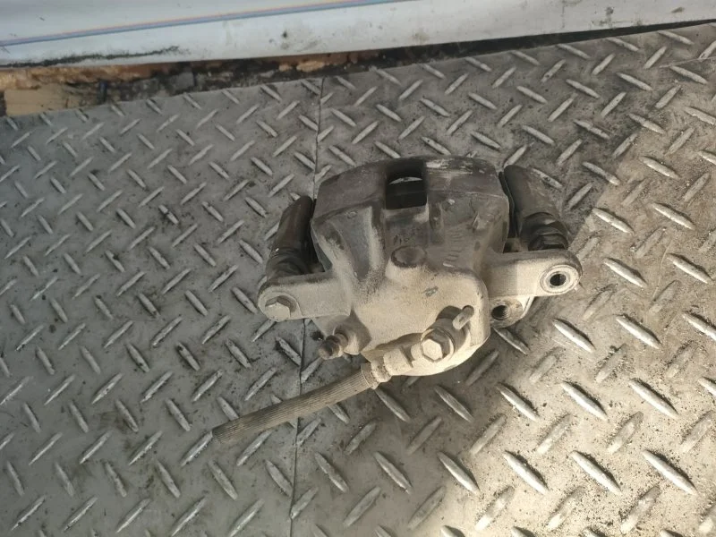 Суппорт тормозной Nissan Micra K12 2005 1.2 CR12 F L