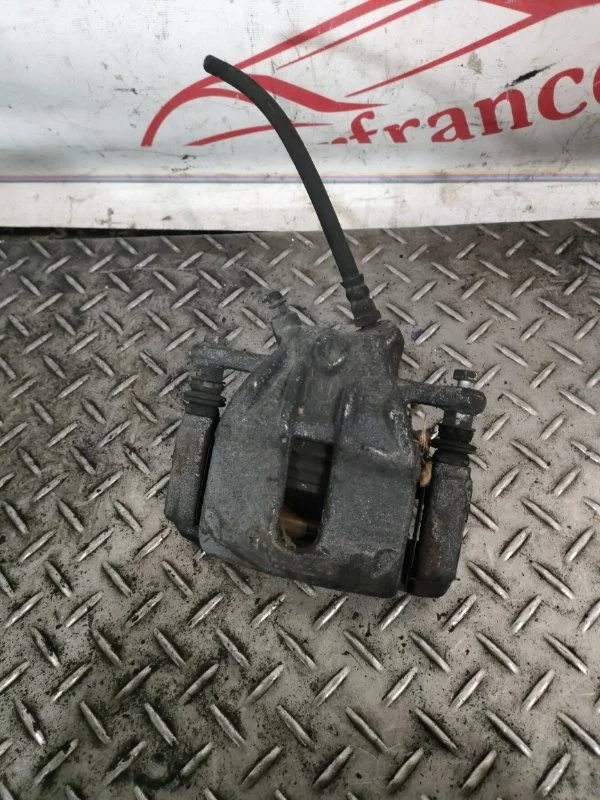 Суппорт тормозной Nissan Micra K12 2005  F R