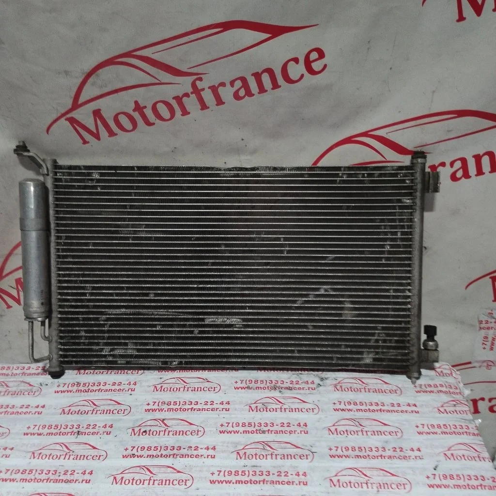 Радиатор кондиционера (конденсер) Nissan Note E11