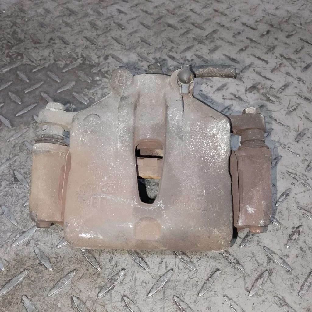 Суппорт тормозной KIA Ceed 1   F R