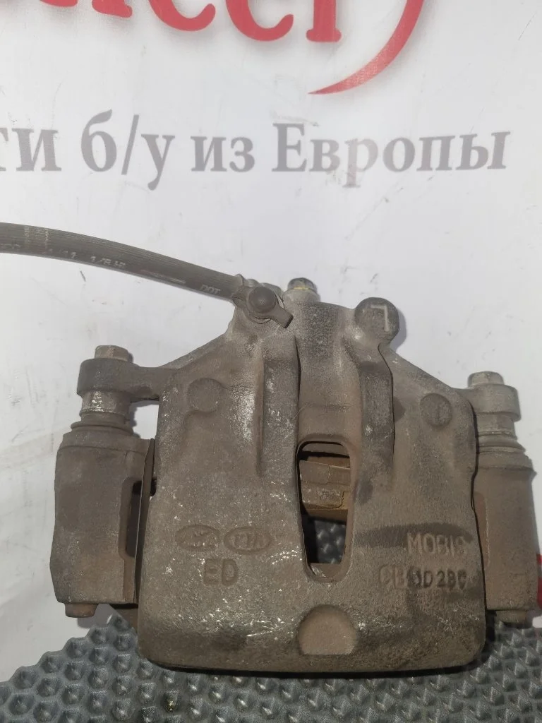 Суппорт тормозной Kia Ceed 1 2011 G4FC F L