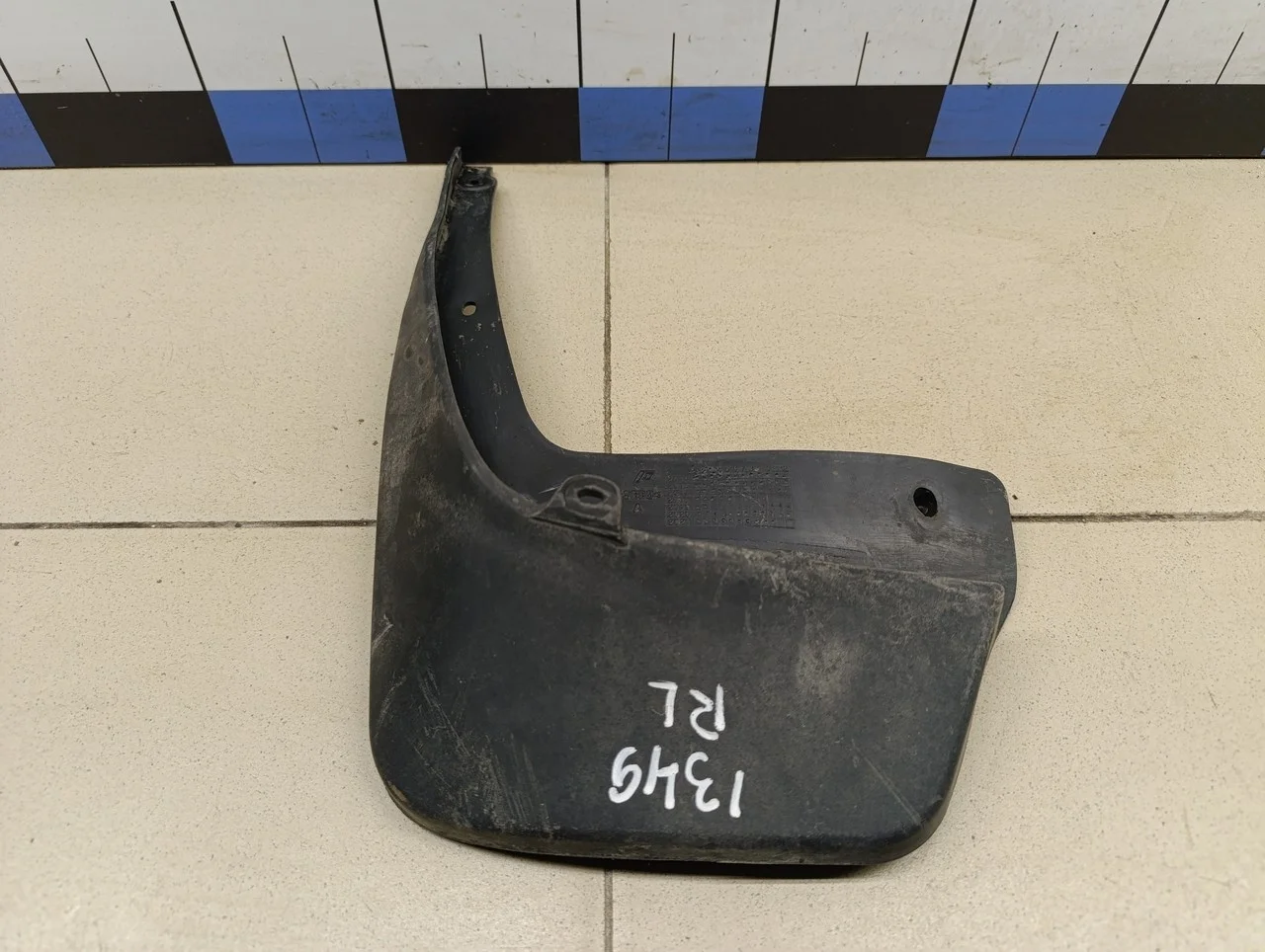 Брызговик задний левый Logan 2005-2014